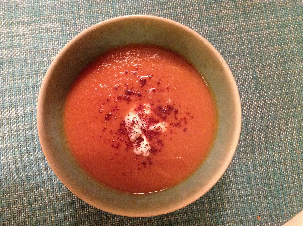 Spicy carrot soup with creme fraiche and sumac