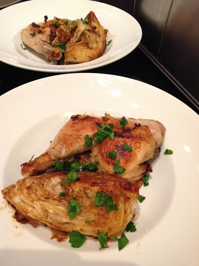 Sous vide confit chicken with sous vide braised green cabbage