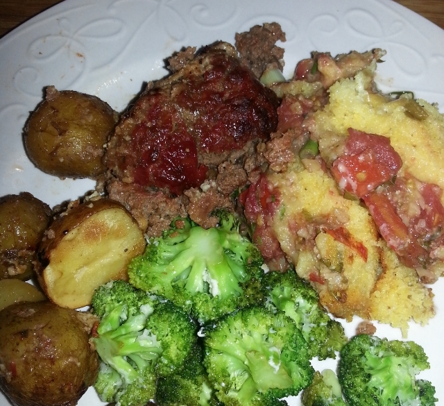 Tomato cobbler takes top billing over meat loaf, potatoes, broccoli. All good.