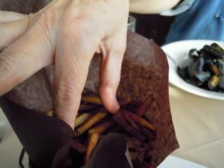 Hungry fingers reaching for the frites.jpg