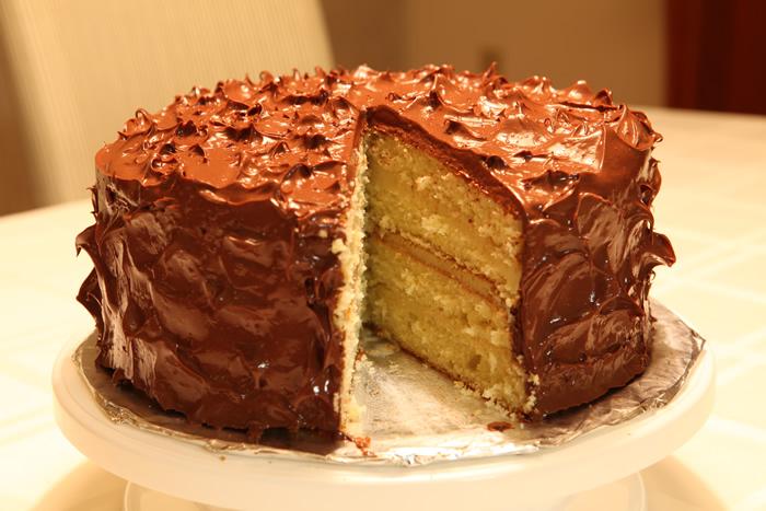 May 2011 yellow cake - chocolate frosting - pistacho ganache filling -IMG_4479 - for posting.jpg