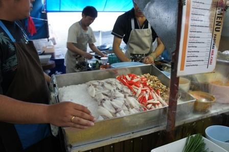 Covered Foodhall - Squid noodle cooks.JPG