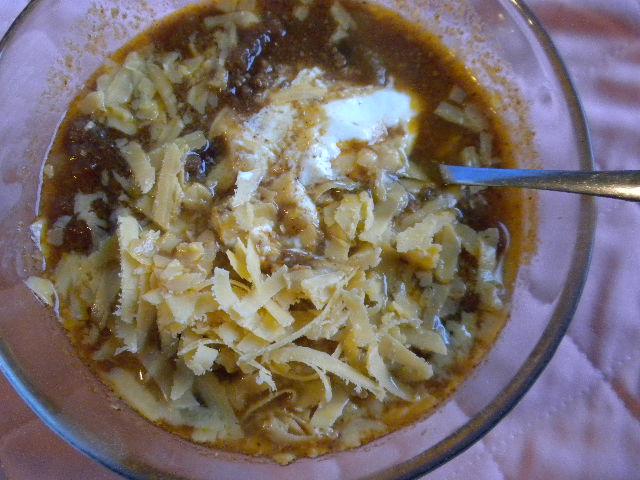 Chili with sour cream and grated cheddar.JPG
