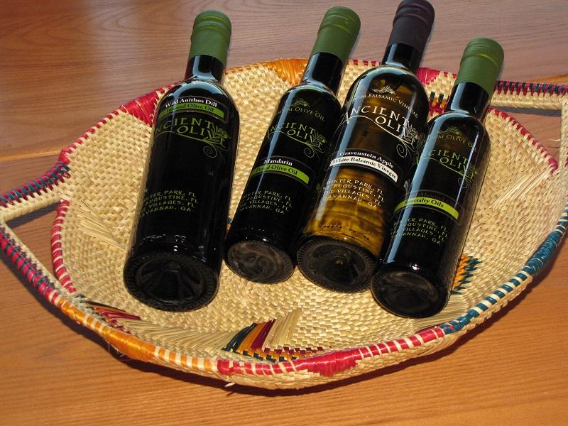 Ugandan basket holding oils and vinegar.jpg