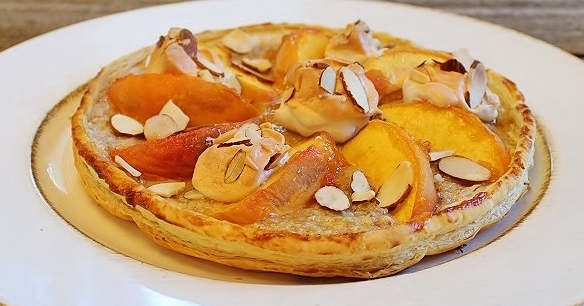 Fresh Peach Tart with Almond Meringues.png