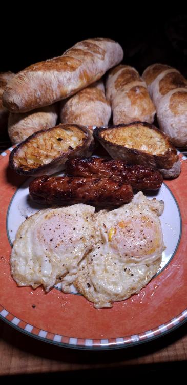 Easy over eggs with bratwurst and toasted baguette September 3rd, 2025.jpg